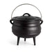 Black cast iron pot with lid on a white background