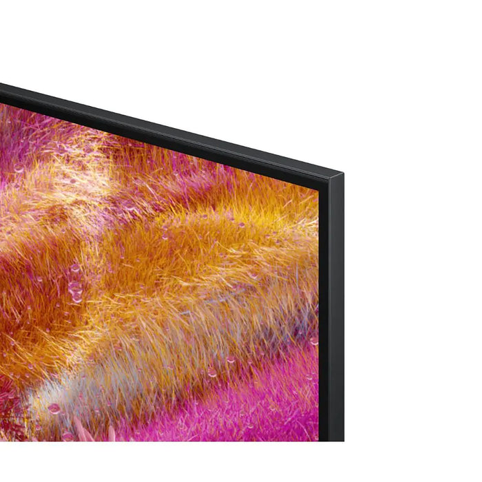 Close-up of a television screen displaying a colorful abstract pattern.