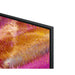Close-up of a television screen displaying a colorful abstract pattern.