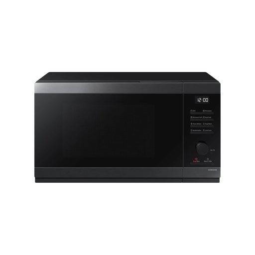 Black microwave oven on a white background