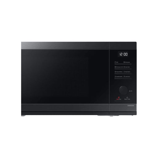 Black microwave oven on a white background