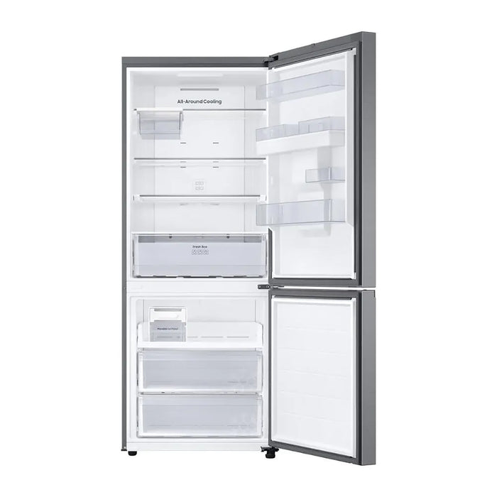 Empty refrigerator with open doors on a white background