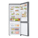 Open refrigerator with various food items on a white background