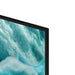 Television screen displaying a nature scene with water and sky.