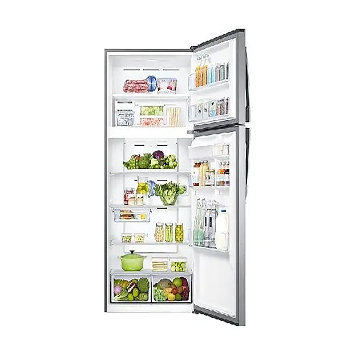 Open refrigerator with various food items on a white background