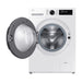 White washing machine with open door on a white background