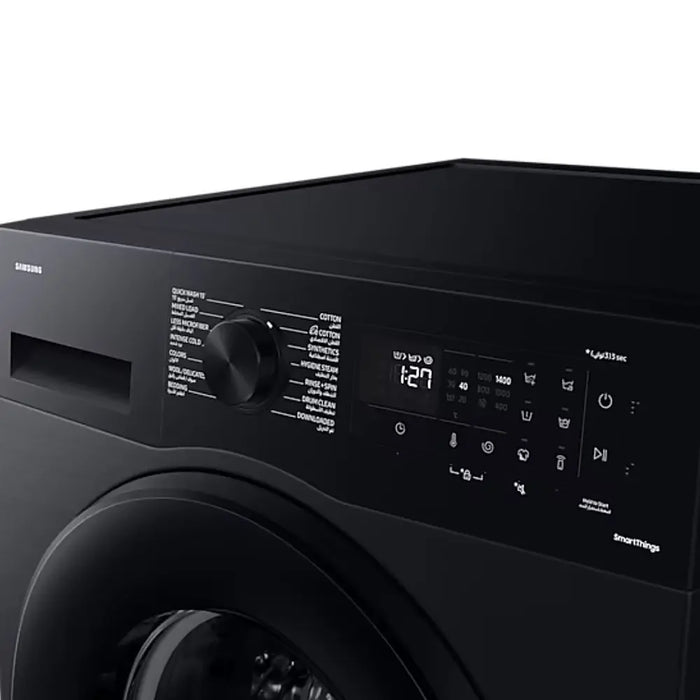 Black Samsung washing machine with digital display and control panel on a white background