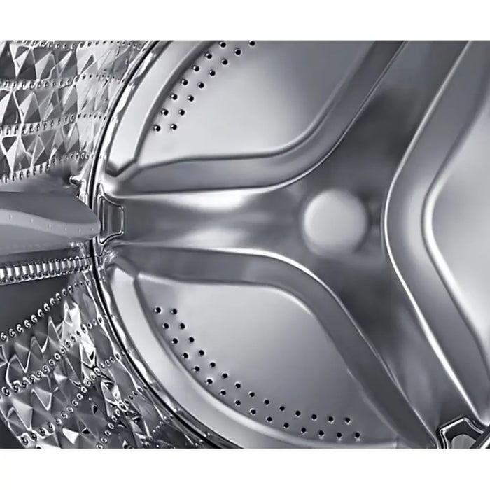 Close-up of a metallic appliance with geometric patterns