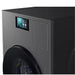 Black washing machine with digital display on a white background