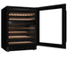 Black wine cooler with open door on a white background