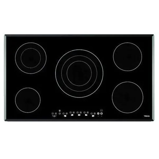 Black electric cooktop with five heating elements on a white background