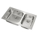 Stainless steel kitchen sink with double basin on a white background