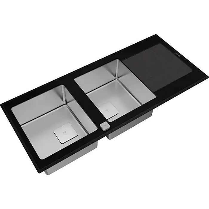 Stainless steel kitchen sink with black glass front on a white background