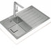 Stainless steel kitchen sink with faucet on a white background