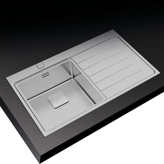 Gray kitchen sink with a black countertop