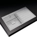 Gray kitchen sink with a black countertop