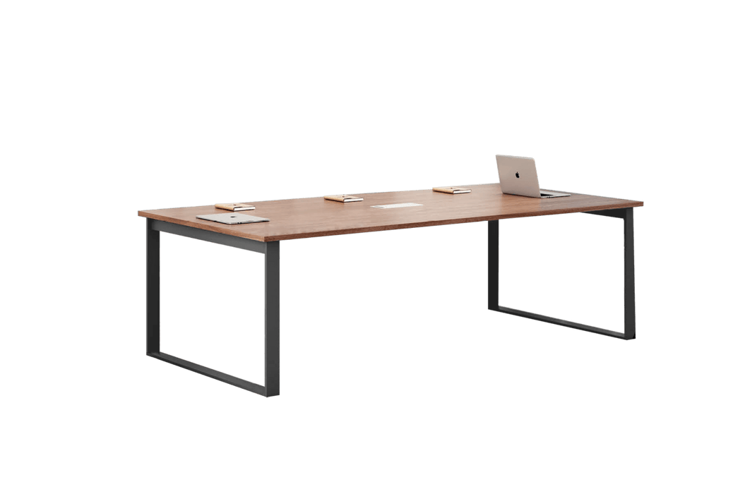 Wooden desk with metal legs on a green background