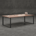 Modern rectangular office meeting table with walnut wood finish, black metal legs, and integrated cable management, styled in a contemporary workspace setting.